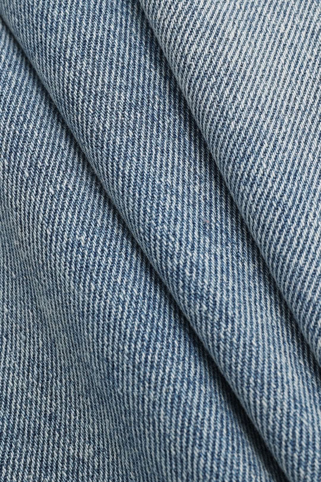 Luna Cross – Asymmetric Waist Denim