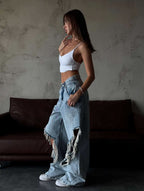 Edge Break – Shredded Wide-Leg Denim